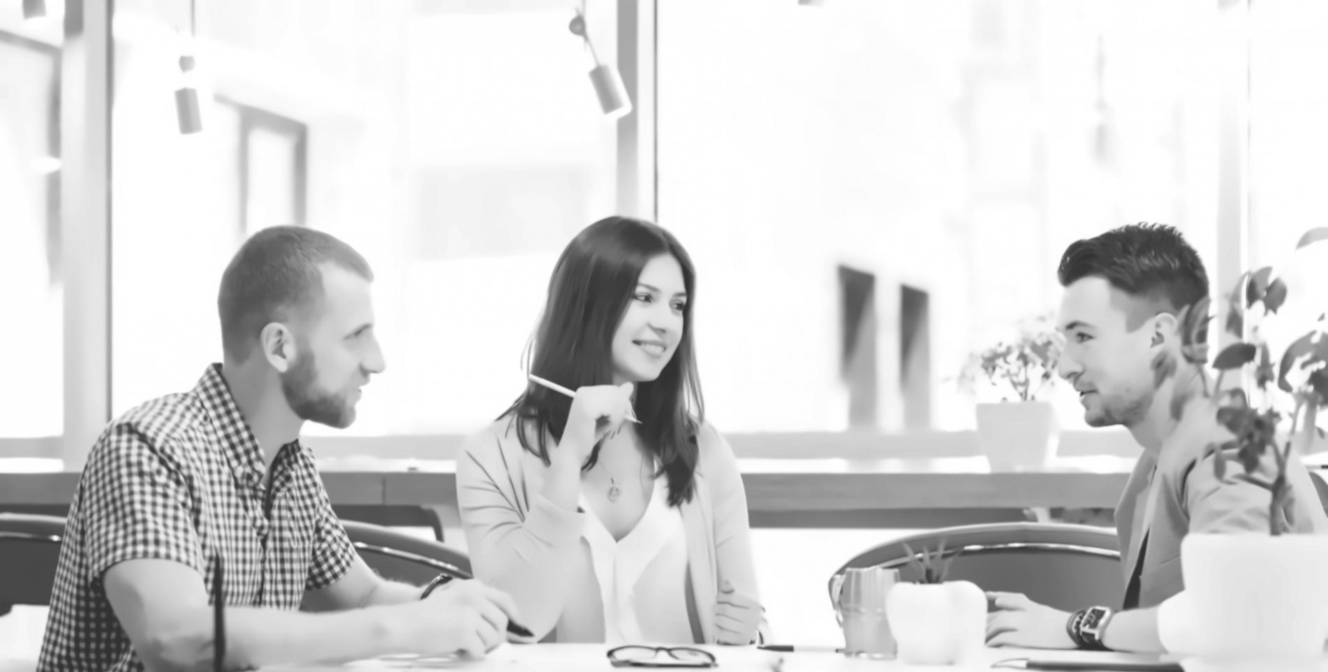 Person working on laptop with financial charts visible